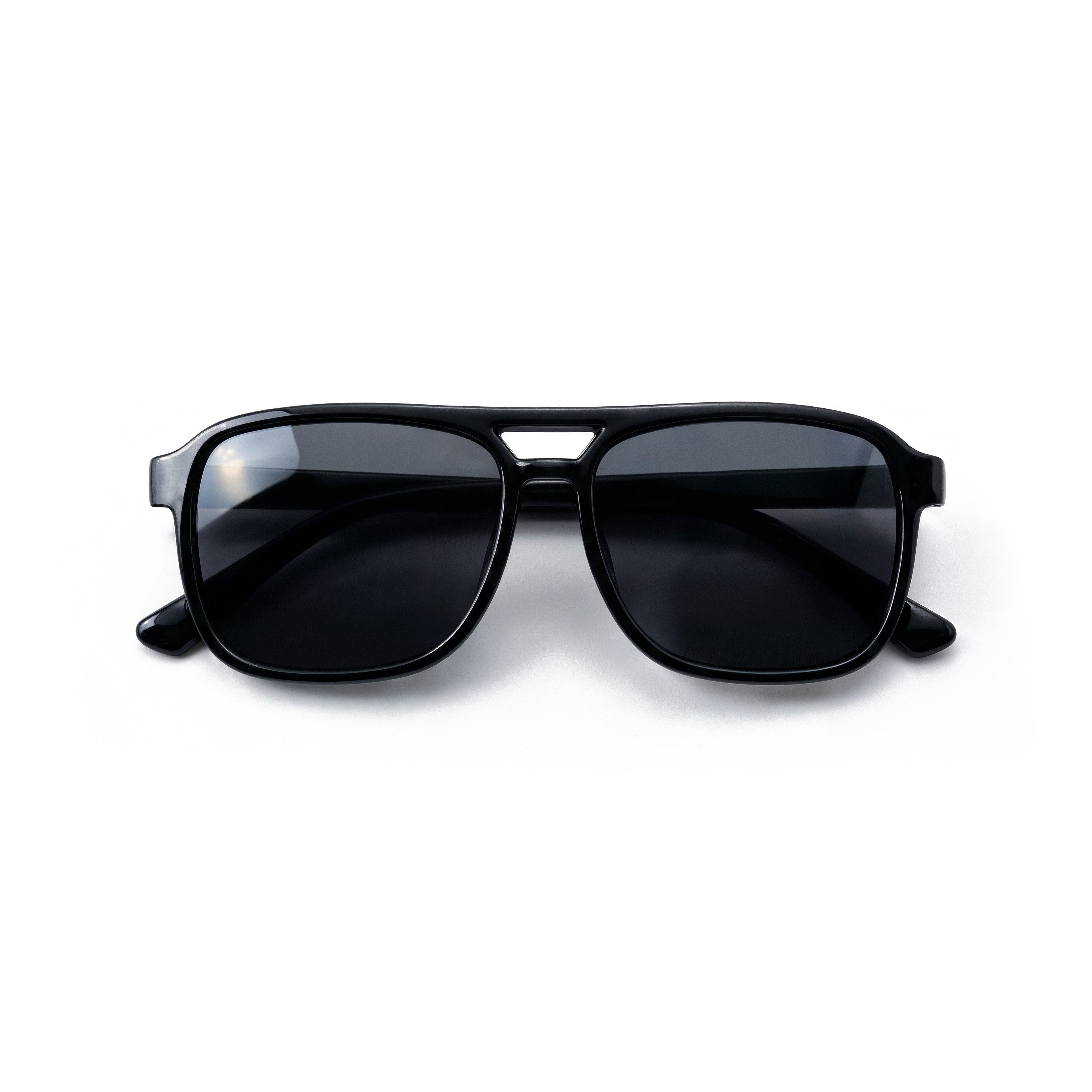 Occhiali da sole zo-oz stile aviator modello hop nero lucido per bambini 6-12 anni piegati e fotografati dall'alto.