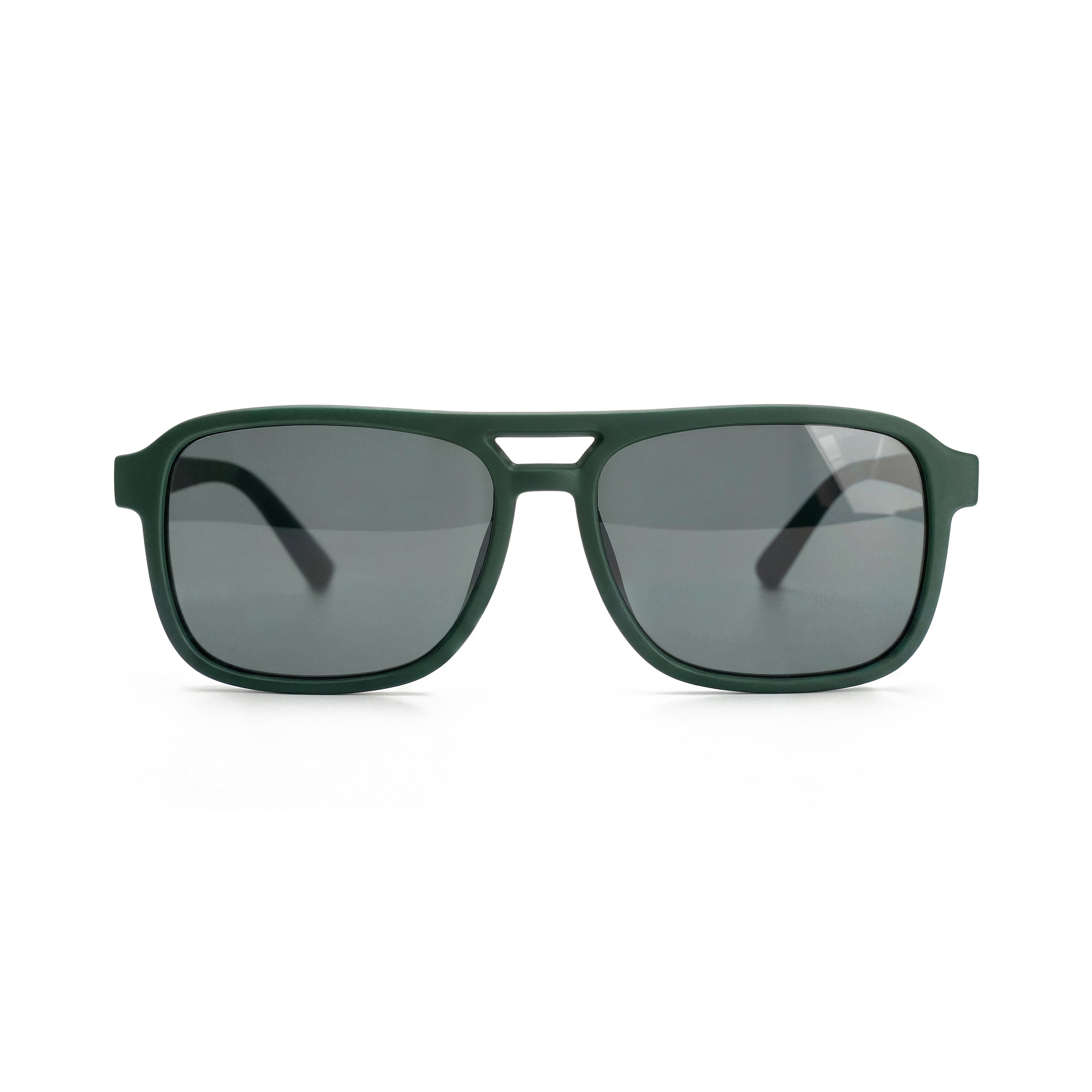 Occhiali da sole zo-oz stile aviator modello Hop verde opaco per bambini 6-12 anni. Inquadratura frontale con le aste aperte appoggiate su una superficie.