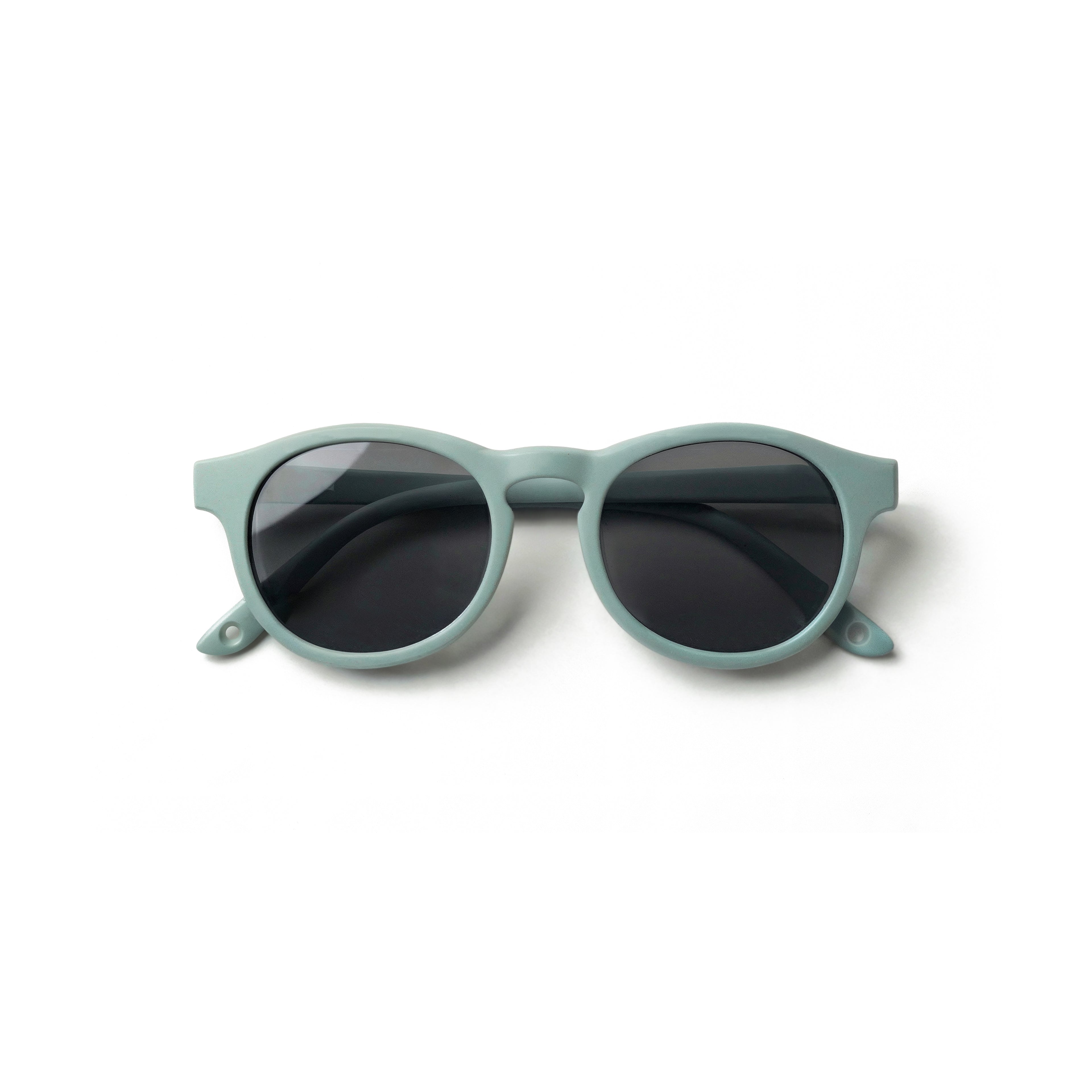 Occhiali da sole zo-oz stile pantos modello Pop blu opaco per bambini 0-2 anni piegati e fotografati dall'alto.