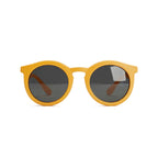 Occhiali da sole zo-oz stile pantos modello Snap giallo opaco per bambini 6-12 anni. Inquadratura frontale con le aste aperte appoggiate su una superficie.