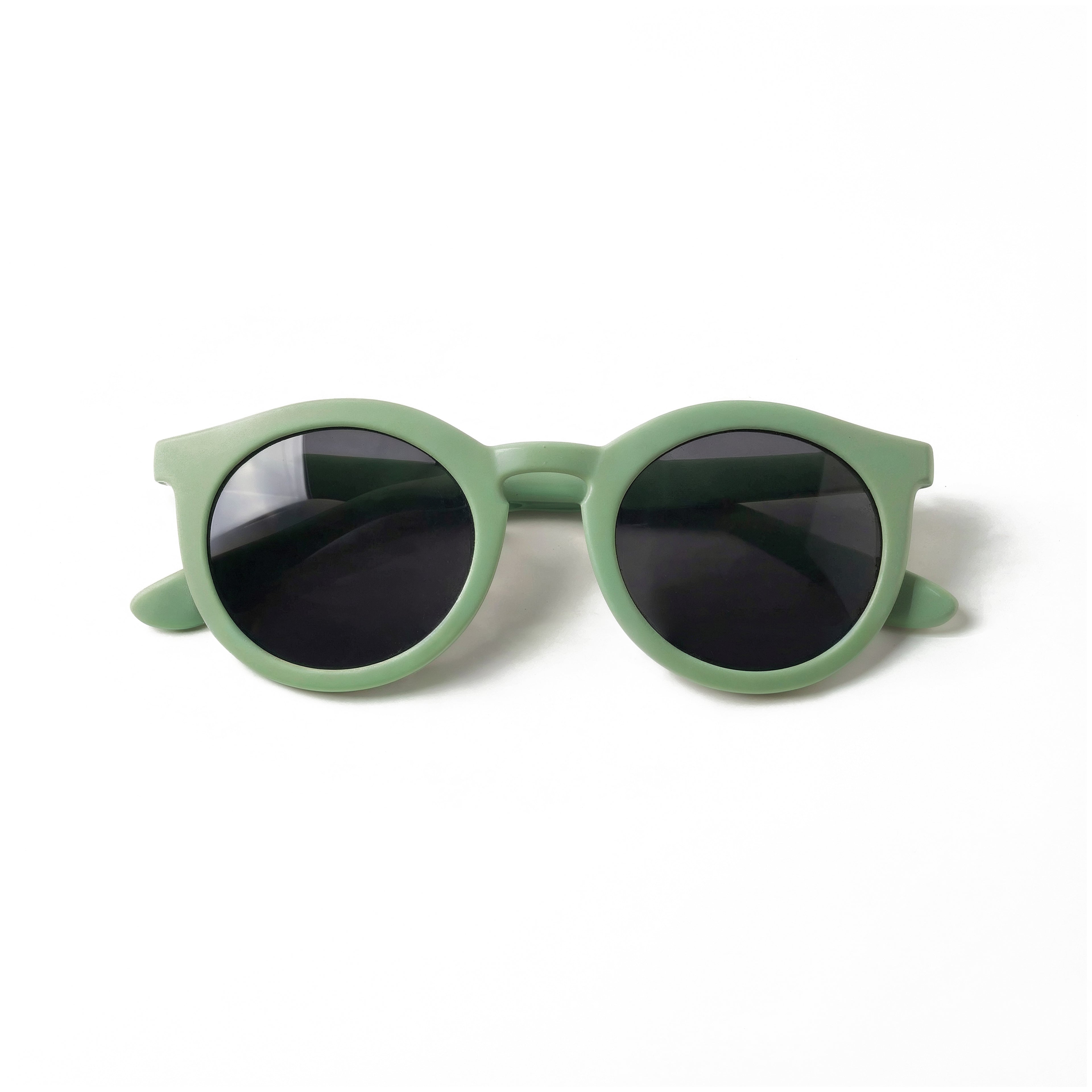 Occhiali da sole zo-oz stile pantos modello Snap verde opaco per bambini 6-12 anni piegati e fotografati dall'alto.